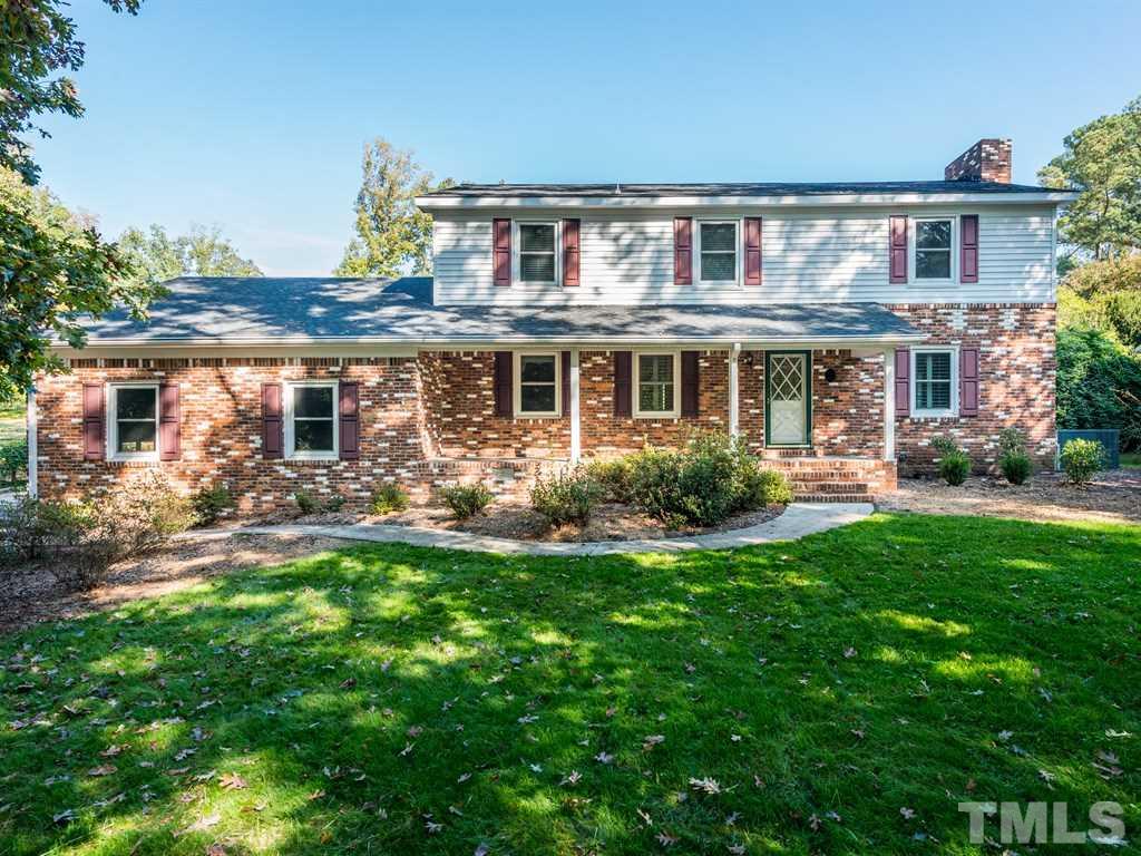 3811 Donna Road Raleigh, NC 27604 - Photo 1 of 25 a front view of a house with a yard