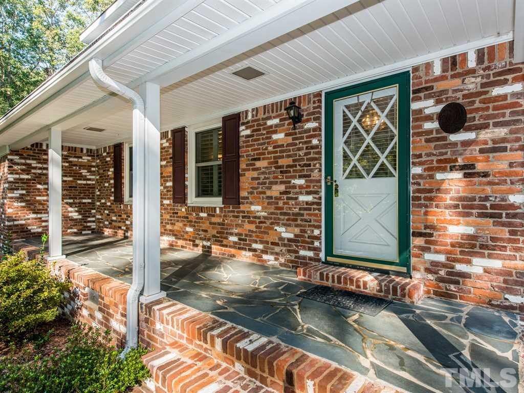 3811 Donna Road Raleigh, NC 27604 - Photo 2 of 25 front view of a house with a porch