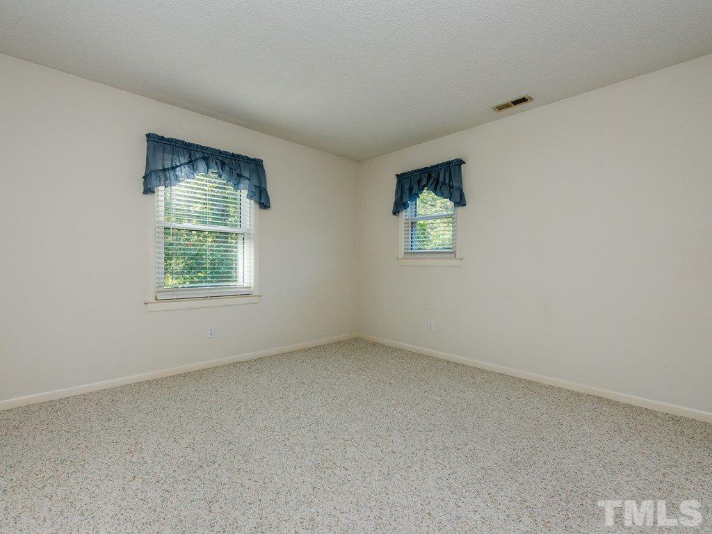 3811 Donna Road Raleigh, NC 27604 - Photo 18 of 25 an empty room with windows