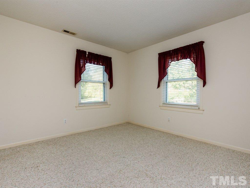 3811 Donna Road Raleigh, NC 27604 - Photo 20 of 25 an empty room with a window
