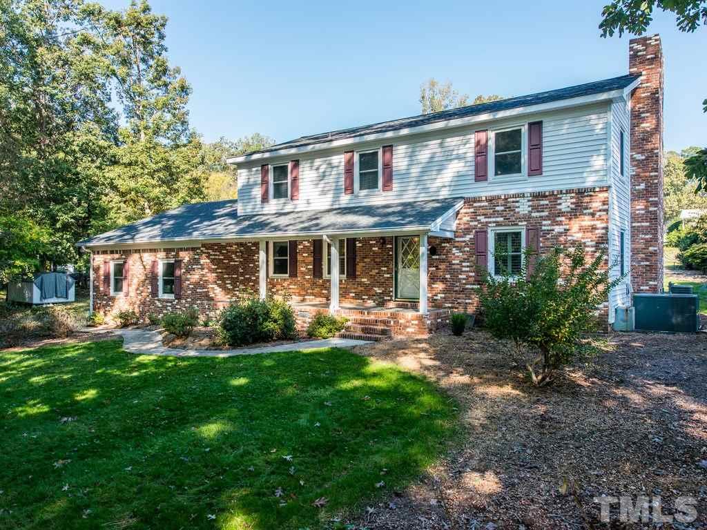 3811 Donna Road Raleigh, NC 27604 - Photo 25 of 25 front view of a house with a yard