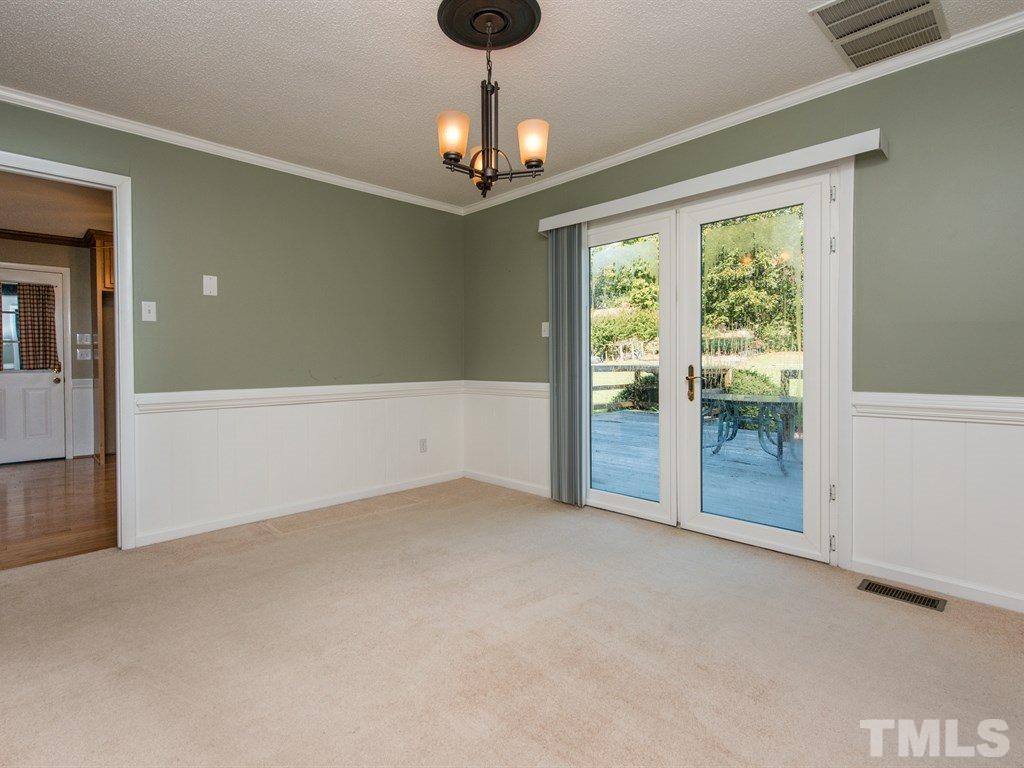 3811 Donna Road Raleigh, NC 27604 - Photo 6 of 25 a view of an empty room with a window