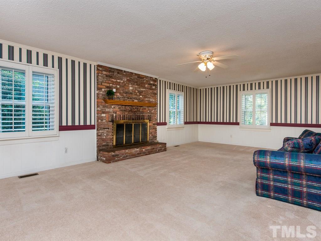 3811 Donna Road Raleigh, NC 27604 - Photo 8 of 25 a view of livingroom with furniture and staircase