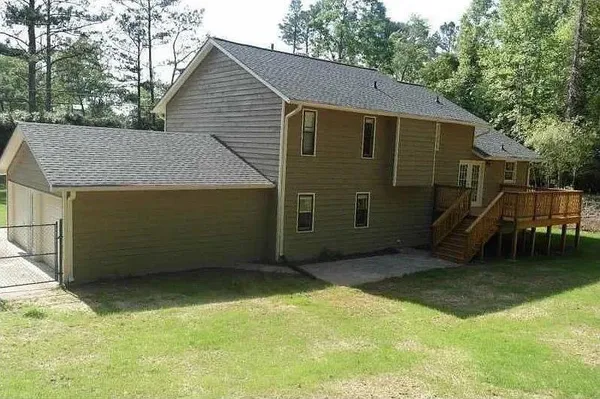 a view of backyard of house