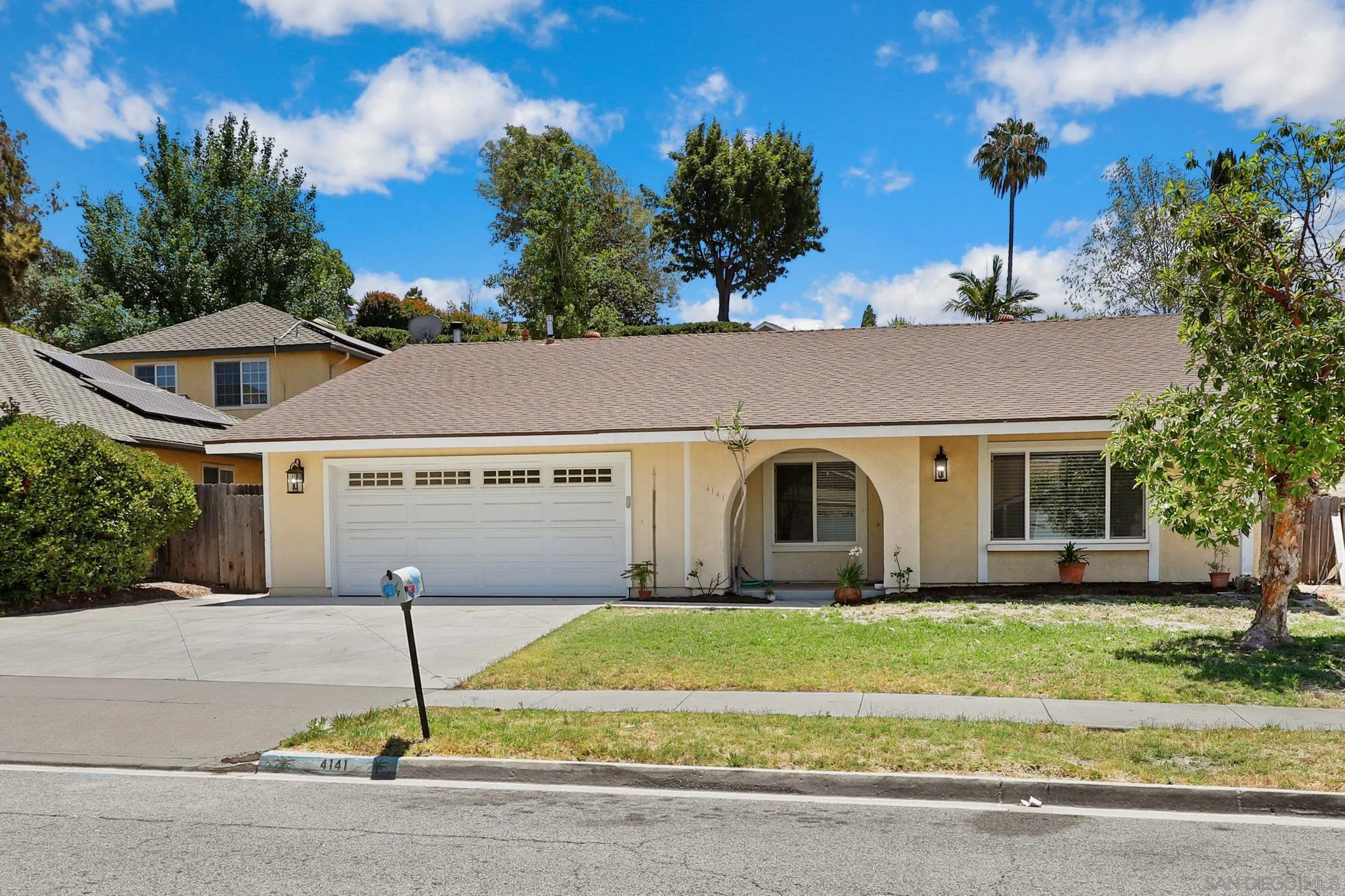 4141 Bryan Street Oceanside, CA 92056 - Photo 1 of 22 a front view of house with yard and green space