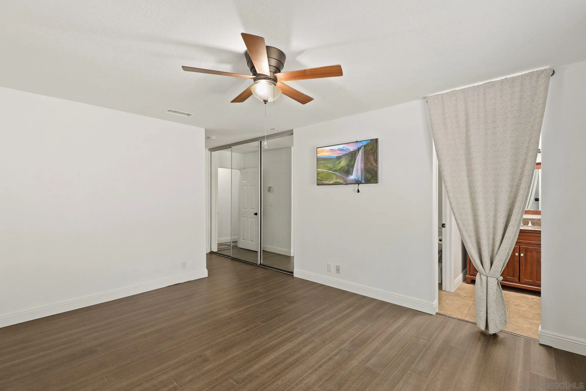 4141 Bryan Street Oceanside, CA 92056 - Photo 13 of 22 wooden floor in an empty room