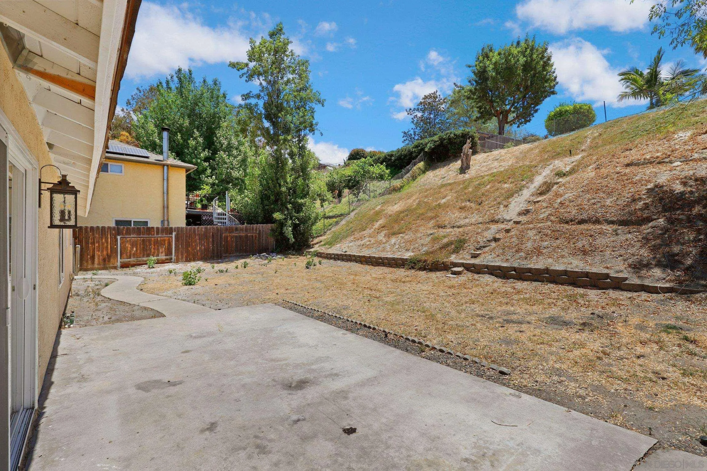 4141 Bryan Street Oceanside, CA 92056 - Photo 19 of 22 a view of a backyard of a house