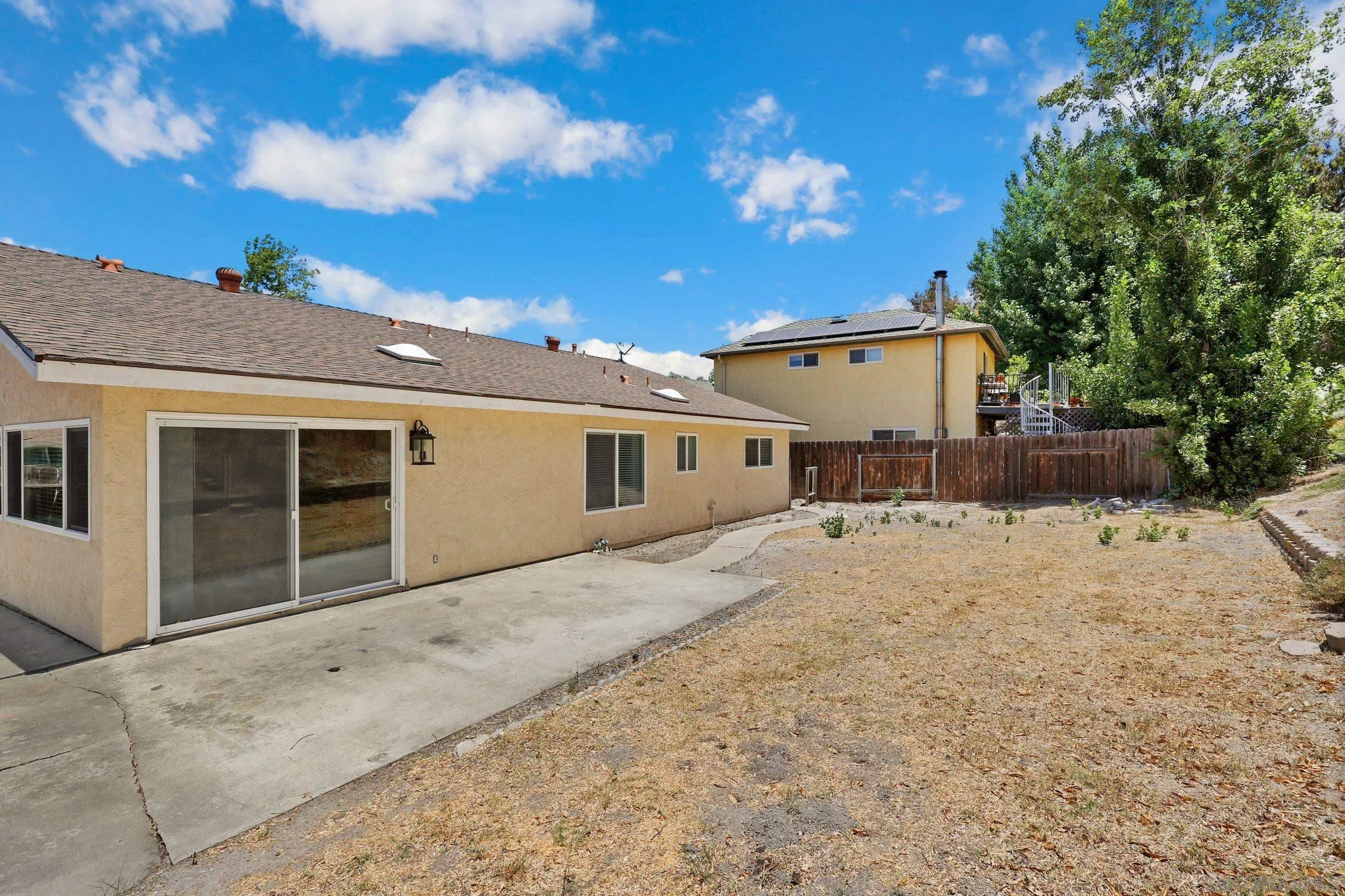 4141 Bryan Street Oceanside, CA 92056 - Photo 20 of 22 a front view of a house with a yard and garage