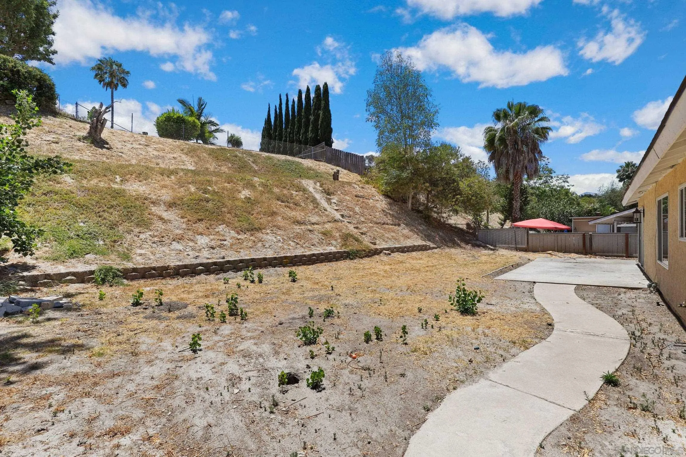 4141 Bryan Street Oceanside, CA 92056 - Photo 21 of 22 a view of a yard with a house