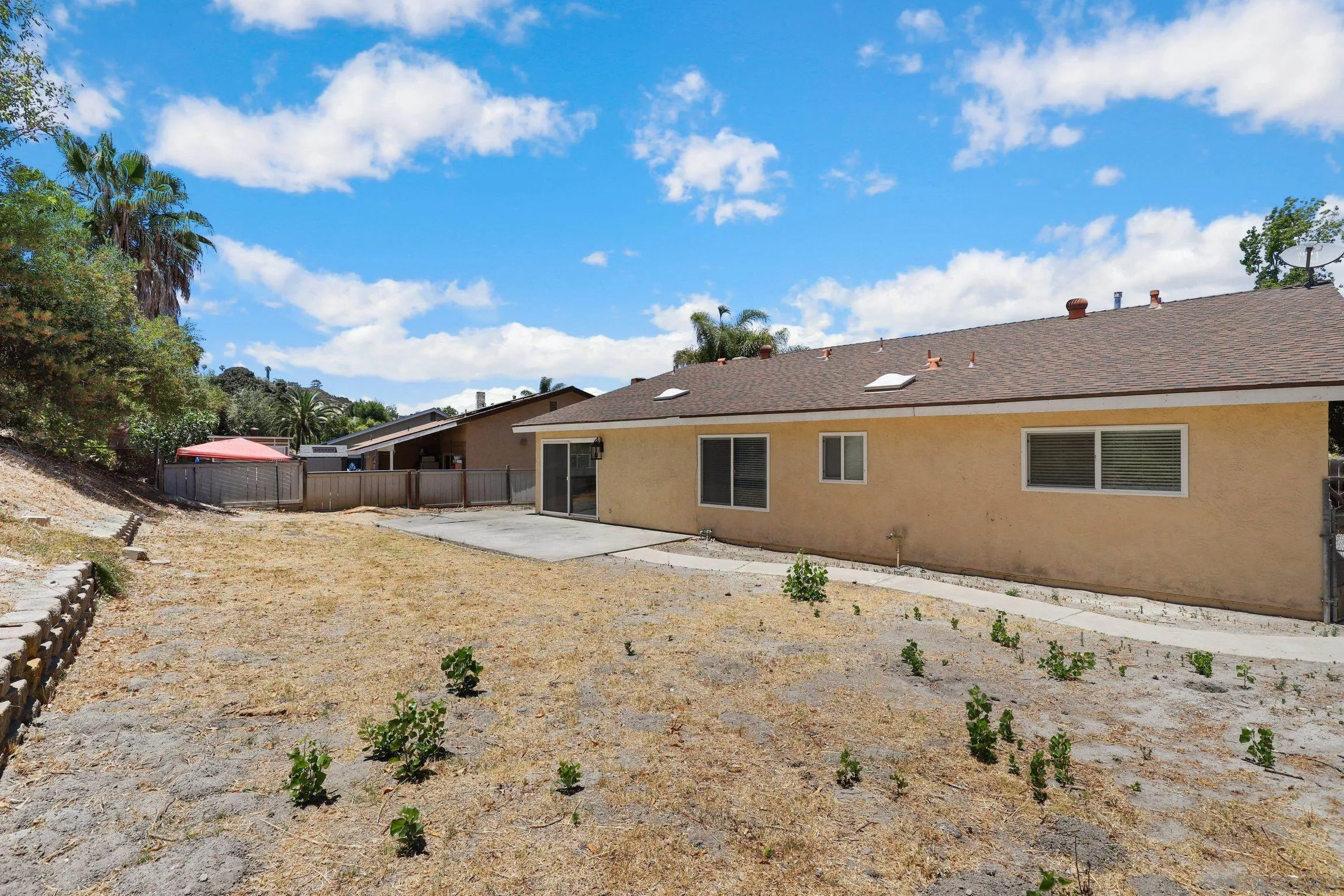 4141 Bryan Street Oceanside, CA 92056 - Photo 22 of 22 a front view of a house with a yard