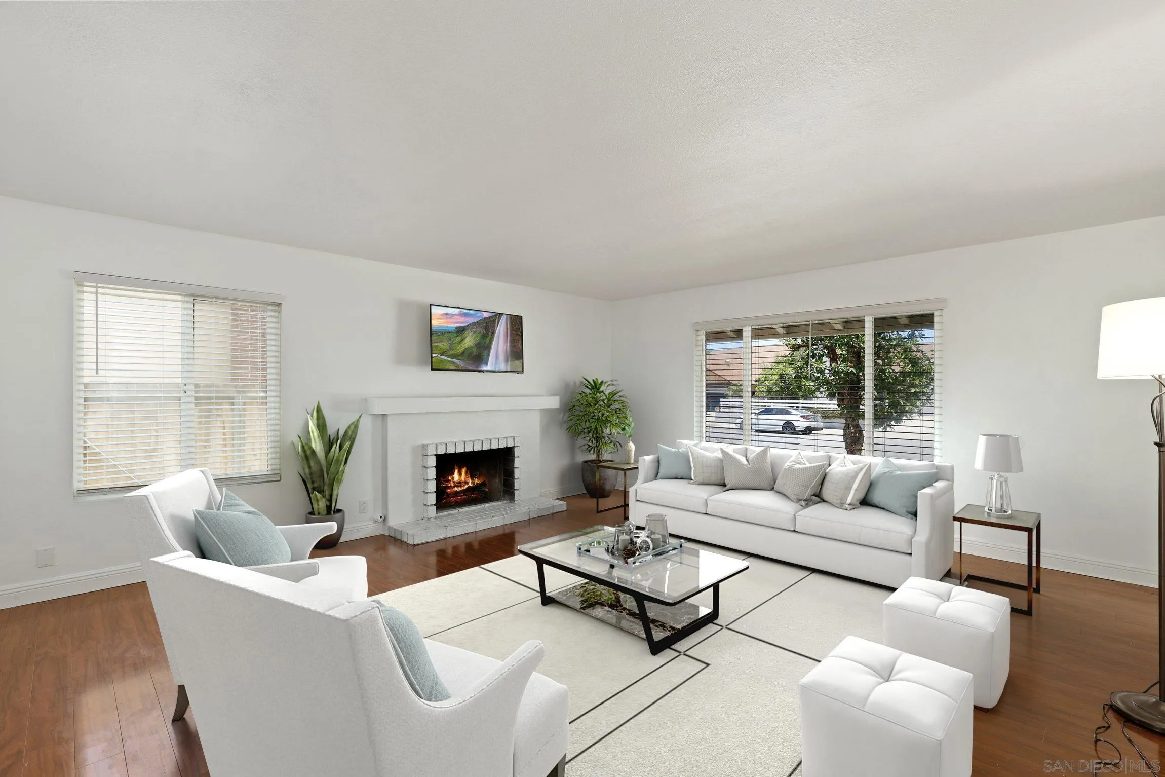 4141 Bryan Street Oceanside, CA 92056 - Photo 3 of 22 a living room with furniture a fireplace and window