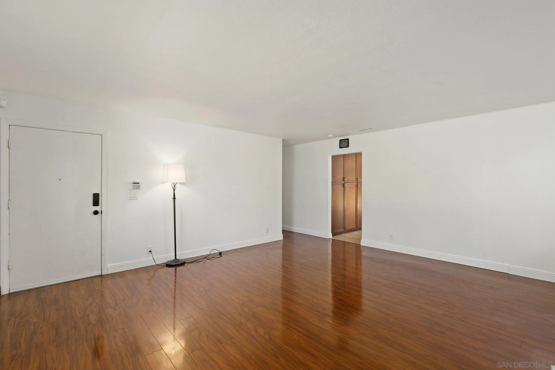 4141 Bryan Street Oceanside, CA 92056 - Photo 5 of 22 a view of an empty room with wooden floor