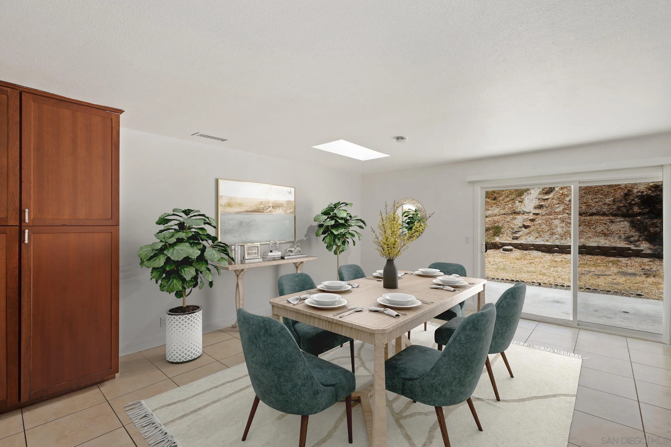 4141 Bryan Street Oceanside, CA 92056 - Photo 10 of 22 a view of a dining room with furniture and potted plant