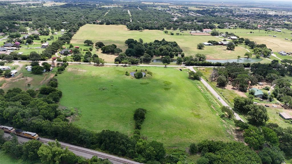 Lot 4 New Hope Road Aubrey, TX 76227 - Photo 5 of 7 a view of a lake with a city