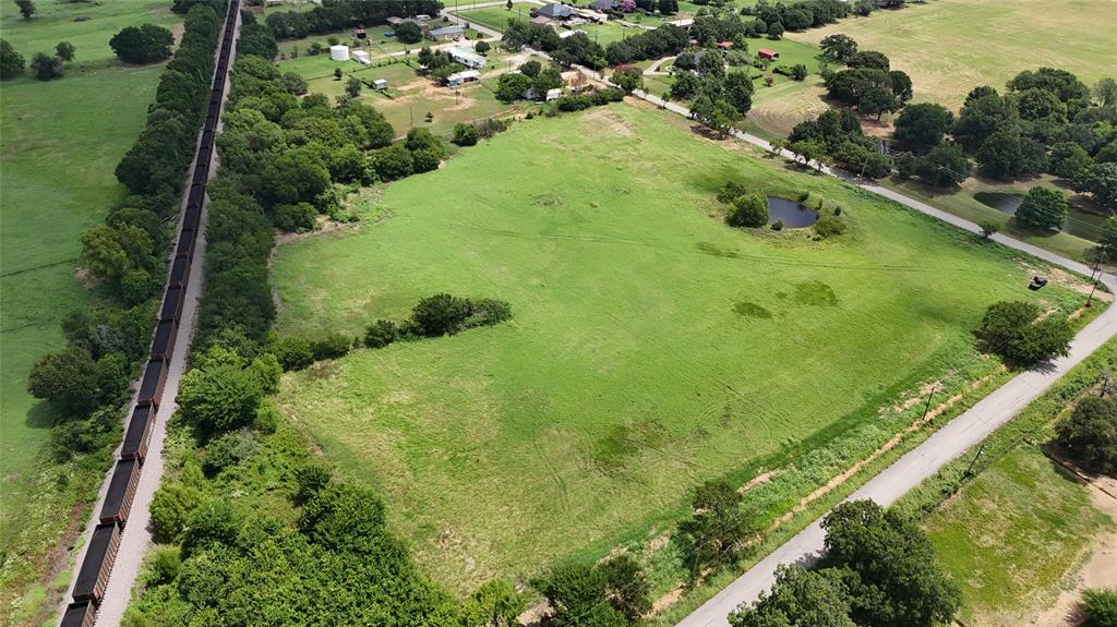 Lot 4 New Hope Road Aubrey, TX 76227 - Photo 7 of 7 a view of a garden with a lake