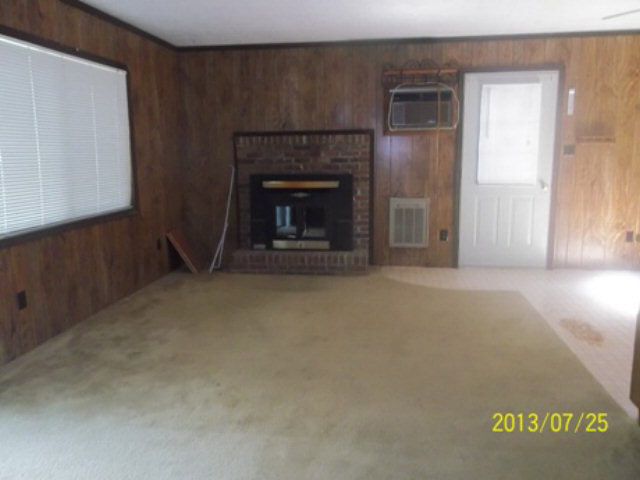 936 North Maple Road Mount Jackson, VA 22842 - Photo 3 of 8 a view of an empty room with a fireplace