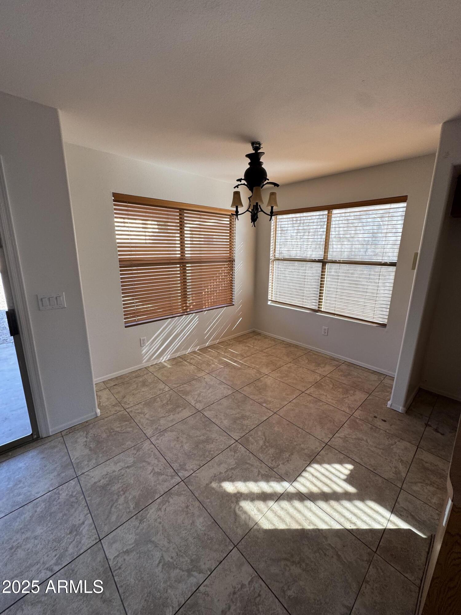 4626 East Weaver Road Phoenix, AZ 85050 - Photo 17 of 21 a view of an empty room and window
