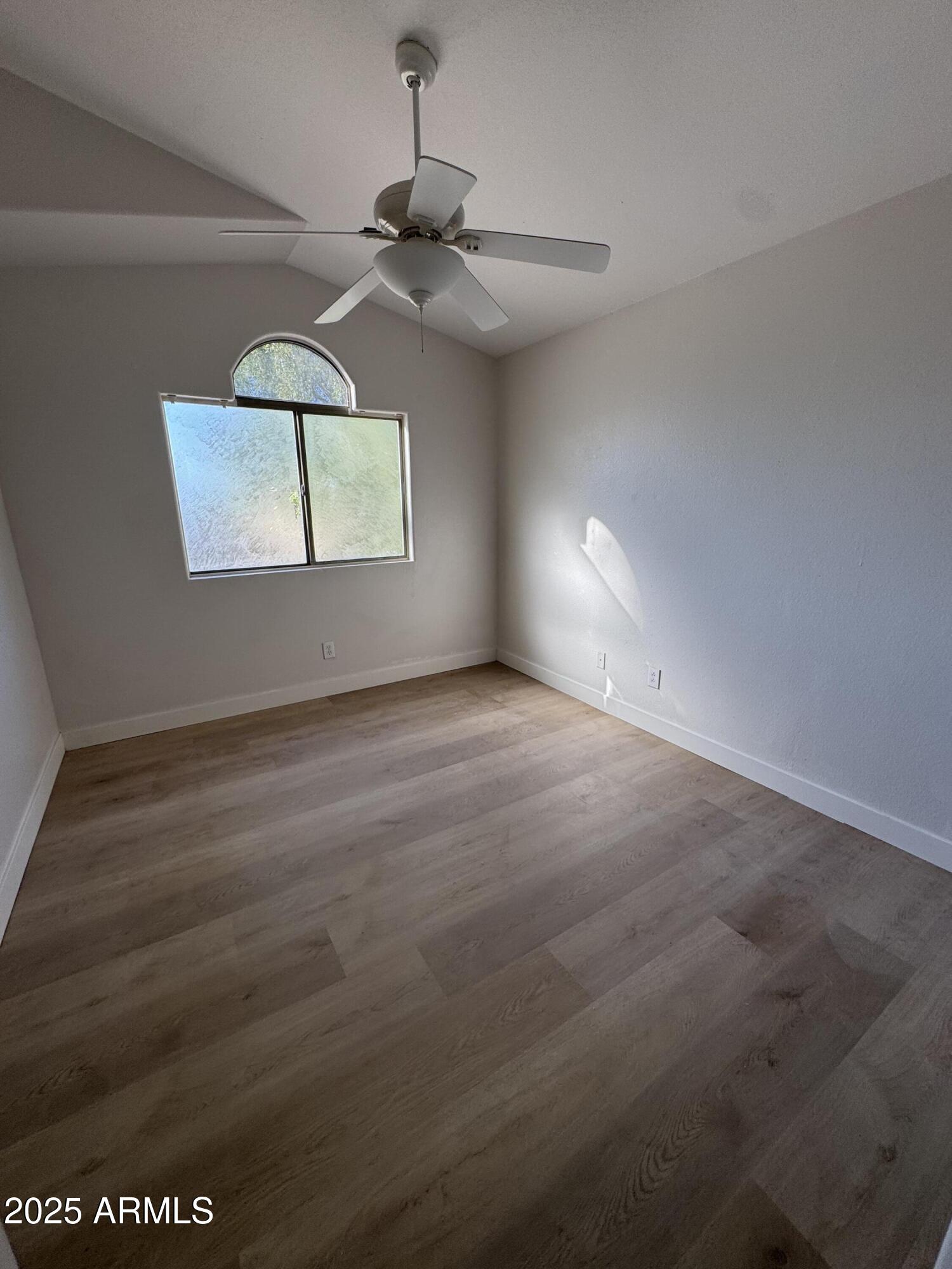4626 East Weaver Road Phoenix, AZ 85050 - Photo 19 of 21 a view of an empty room with a window