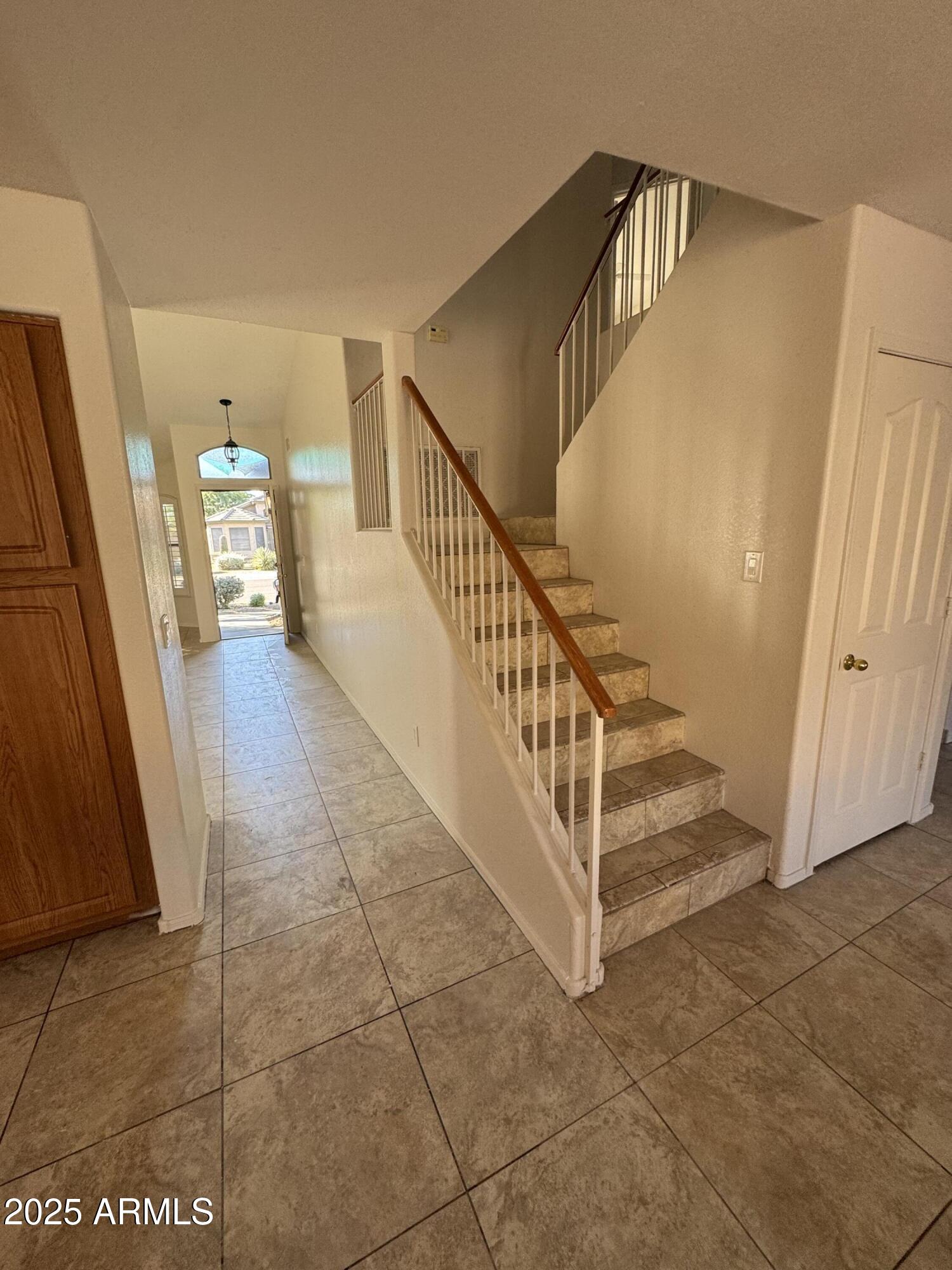 4626 East Weaver Road Phoenix, AZ 85050 - Photo 20 of 21 a view of a hallway with staircase