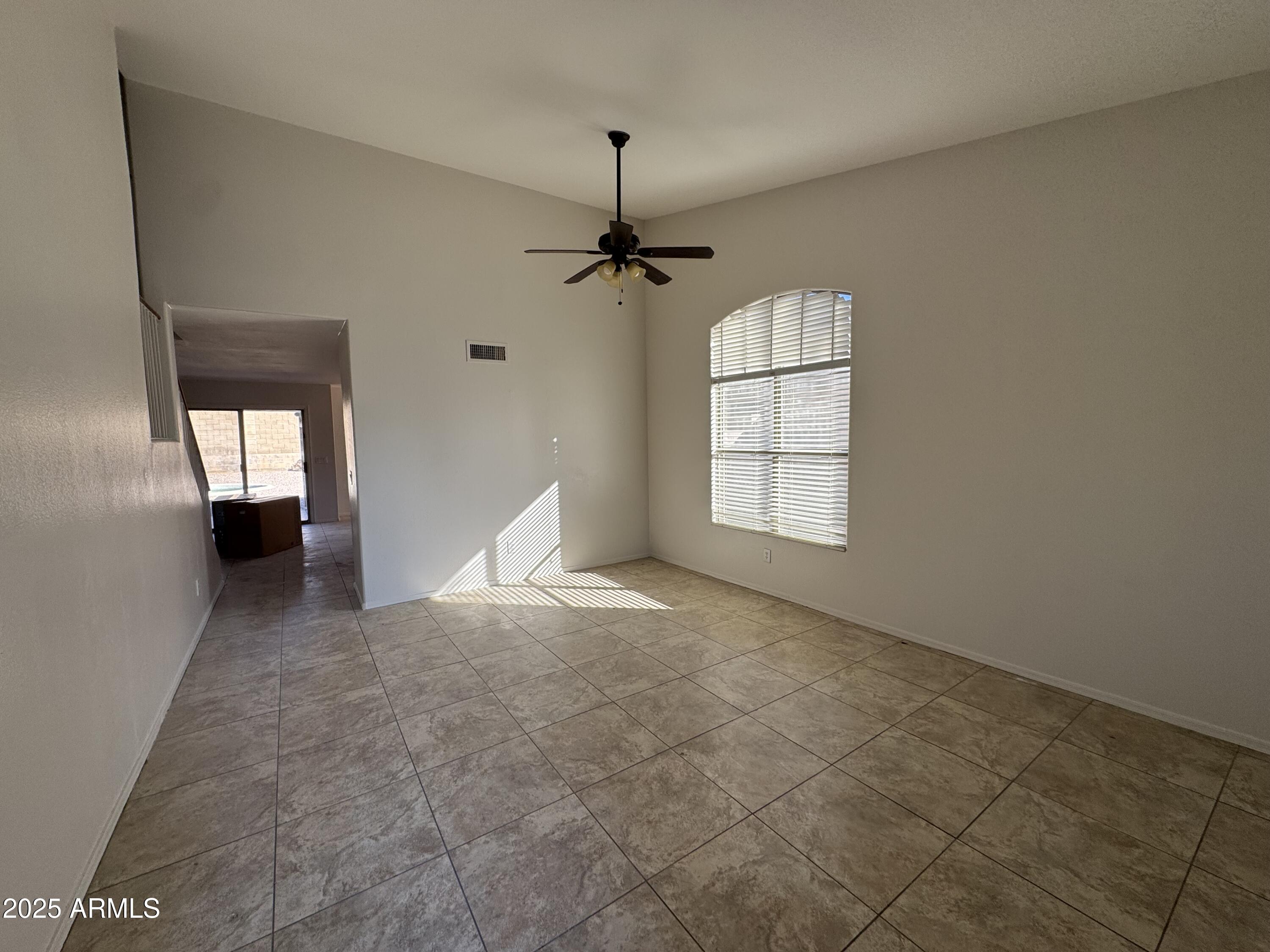 4626 East Weaver Road Phoenix, AZ 85050 - Photo 3 of 21 a view of empty room with windows