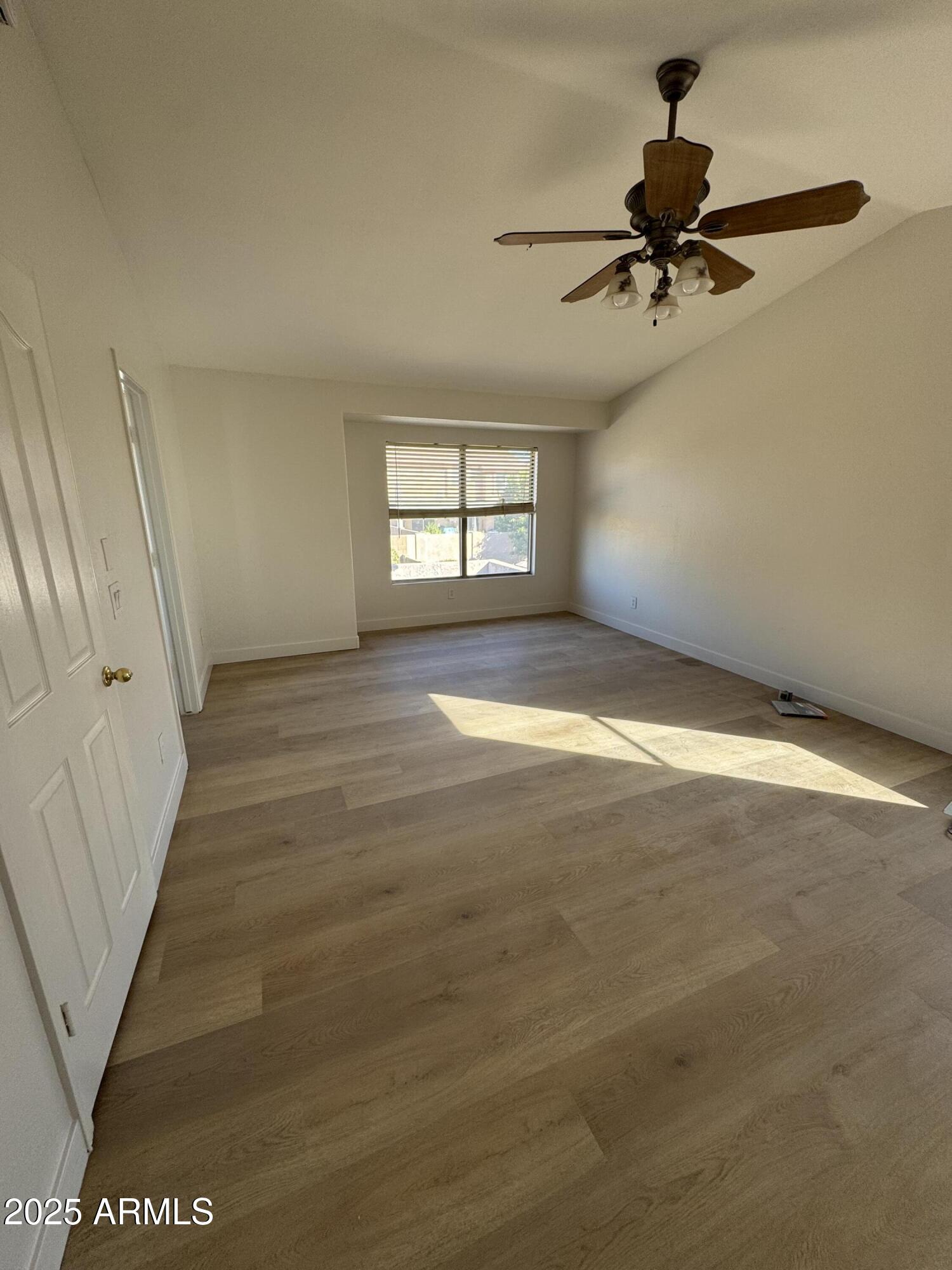 4626 East Weaver Road Phoenix, AZ 85050 - Photo 10 of 21 a view of room window and a ceiling fan