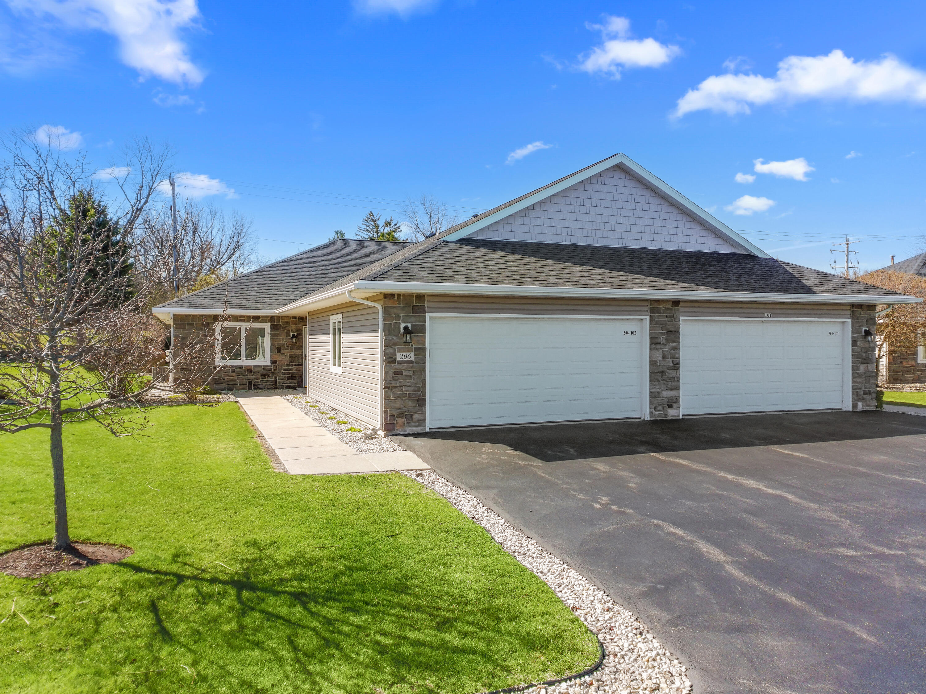 206 Potter Road, Unit 102 Elkhorn, WI 53121 - Photo 2 of 22 Garage