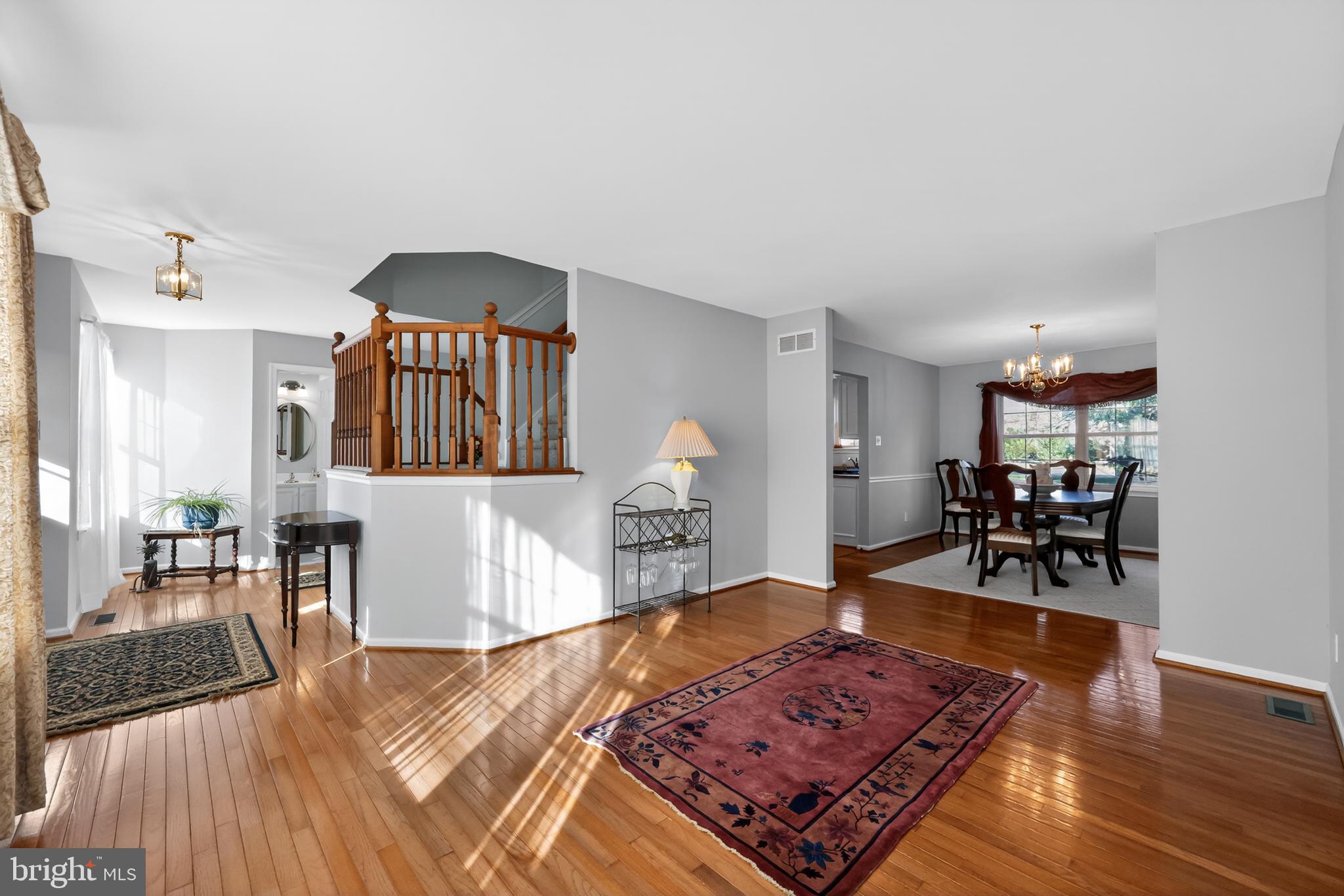 25 Country Lane Voorhees, NJ 08043 - Photo 15 of 36 a living room with furniture and a wooden floor