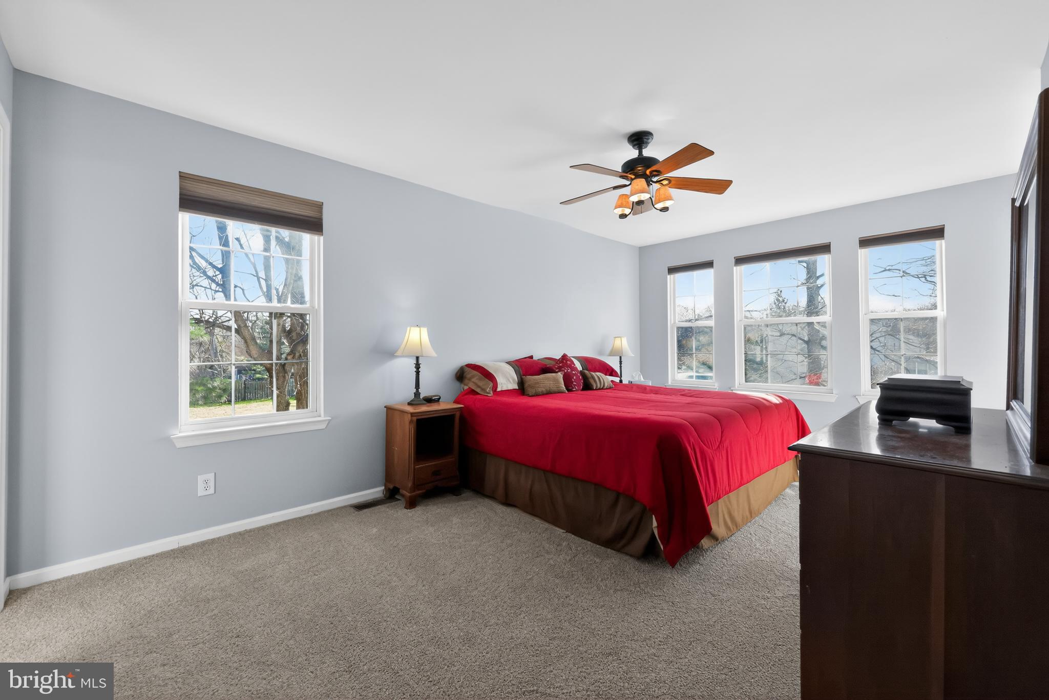 25 Country Lane Voorhees, NJ 08043 - Photo 20 of 36 a spacious bedroom with a bed and a window