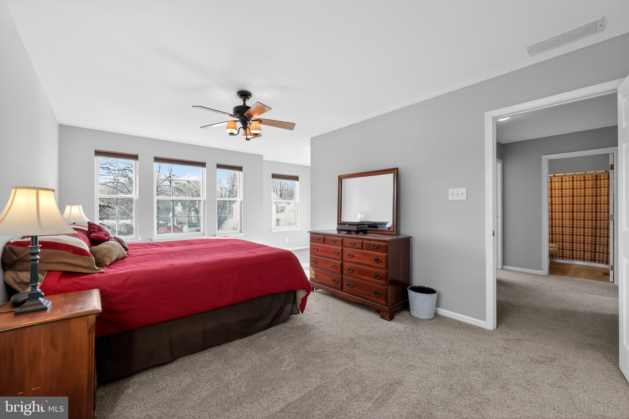 25 Country Lane Voorhees, NJ 08043 - Photo 21 of 36 a bed room with a bed and a chandelier