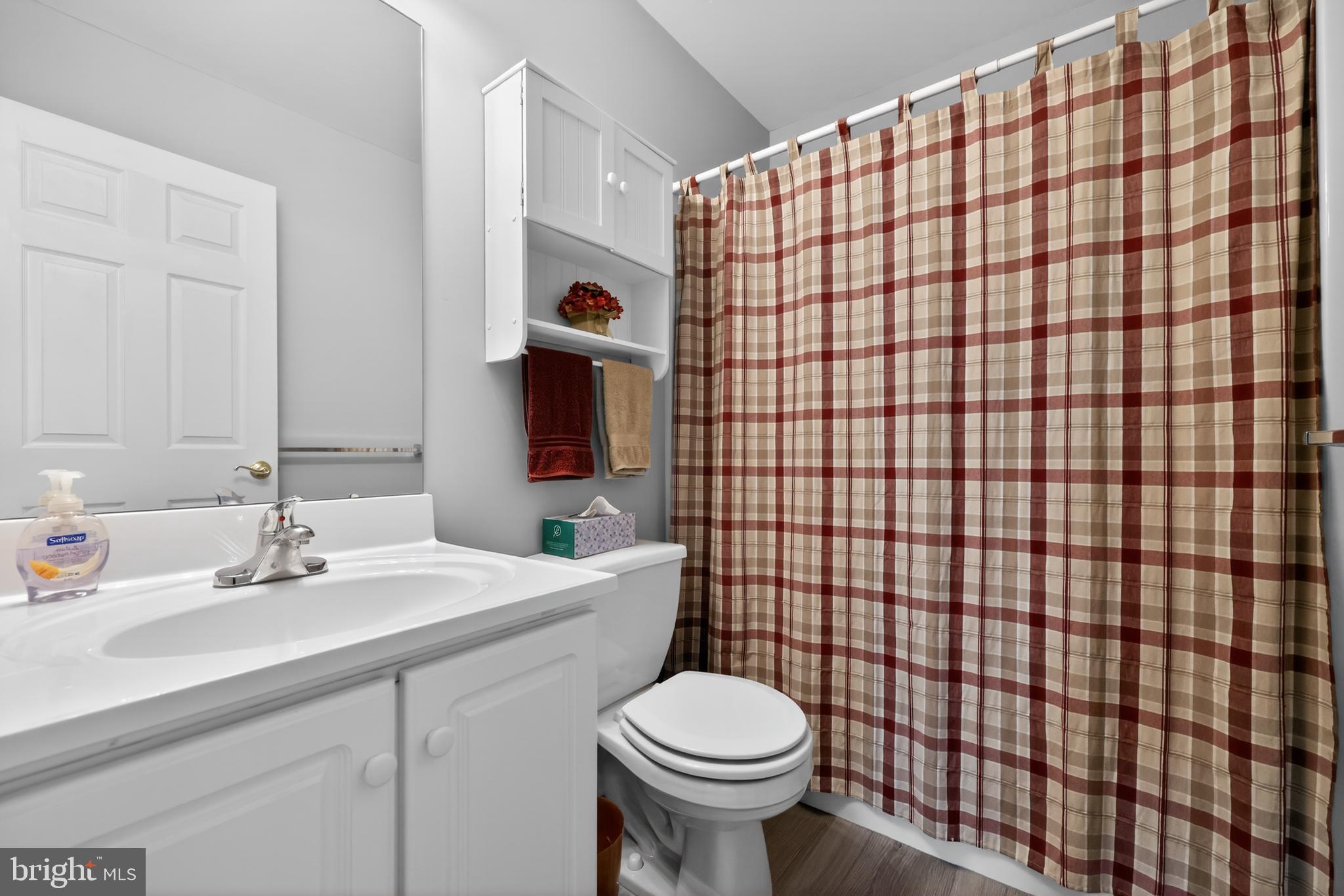 25 Country Lane Voorhees, NJ 08043 - Photo 30 of 36 a bathroom with a sink toilet and shower