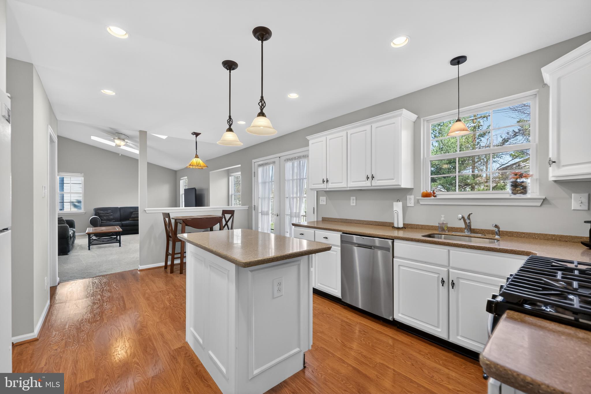 25 Country Lane Voorhees, NJ 08043 - Photo 7 of 36 a kitchen with counter top space a sink appliances and cabinets