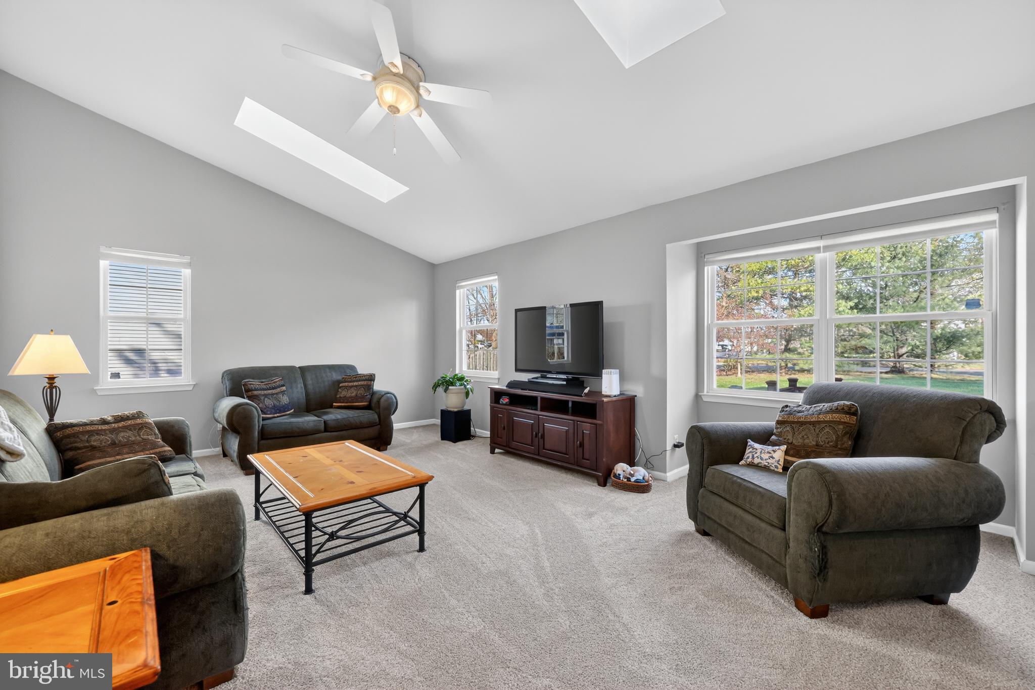 25 Country Lane Voorhees, NJ 08043 - Photo 8 of 36 a living room with furniture and a flat screen tv