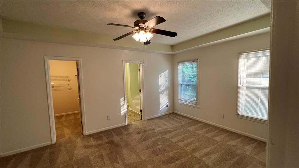 995 Old Spring Way Northeast Sugar Hill, GA 30518 - Photo 18 of 36 a view of empty room with window