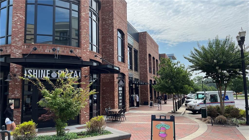 995 Old Spring Way Northeast Sugar Hill, GA 30518 - Photo 24 of 36 a view of a building with sitting area