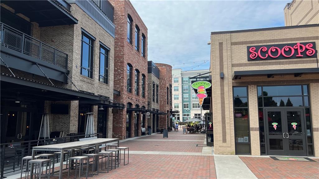 995 Old Spring Way Northeast Sugar Hill, GA 30518 - Photo 27 of 36 a view of street with sitting area
