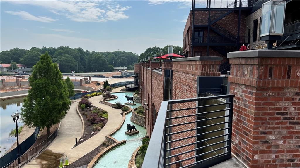 995 Old Spring Way Northeast Sugar Hill, GA 30518 - Photo 28 of 36 a utility room with multiple dryer and washer