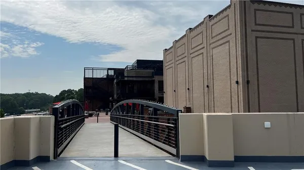 a view of balcony with furniture