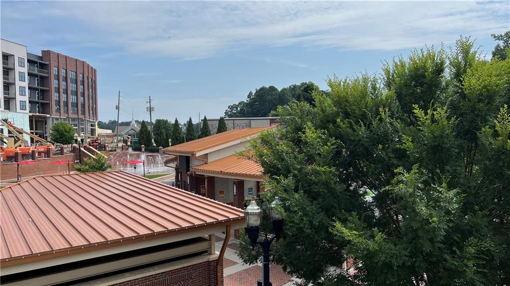 995 Old Spring Way Northeast Sugar Hill, GA 30518 - Photo 36 of 36 a view of a patio with swimming pool
