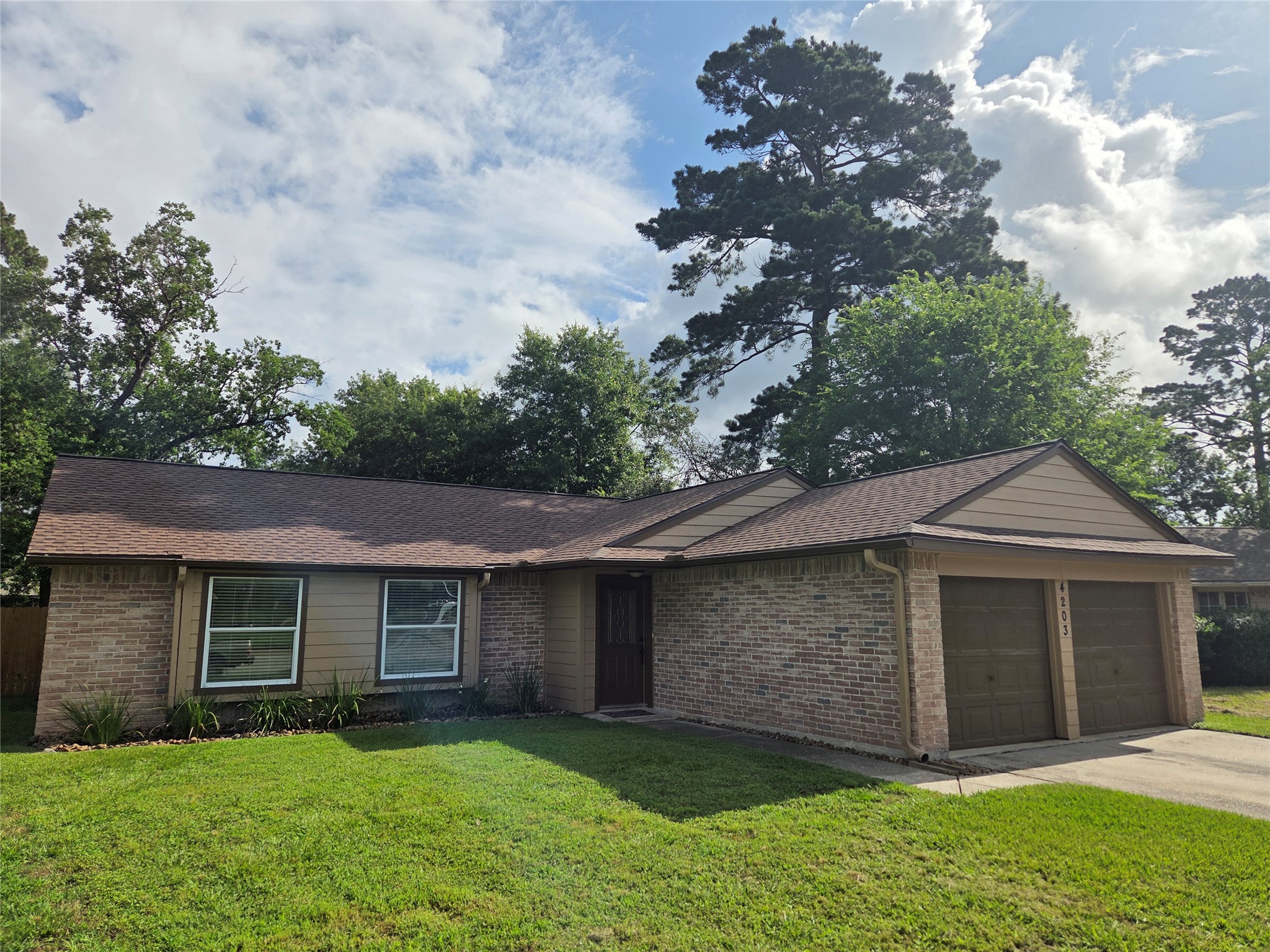 4203 Spinks Creek Lane Spring, TX 77388 - Photo 1 of 14 a view of a house with a yard