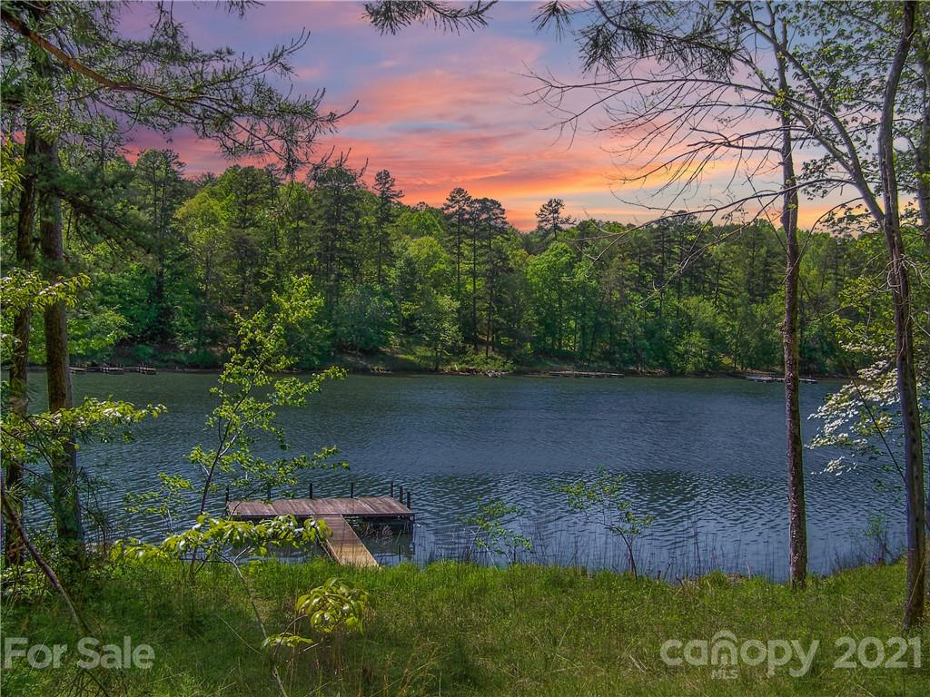 a view of a lake with a yard