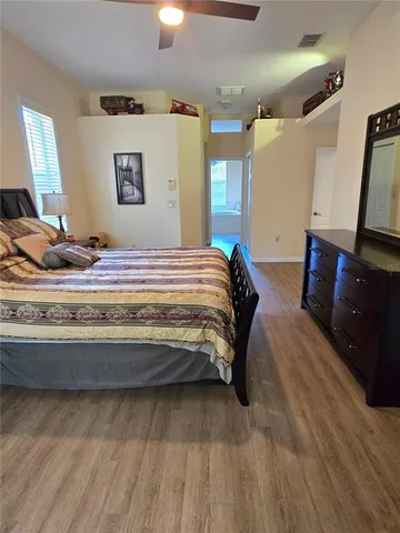 a kitchen with a sink cabinets and window
