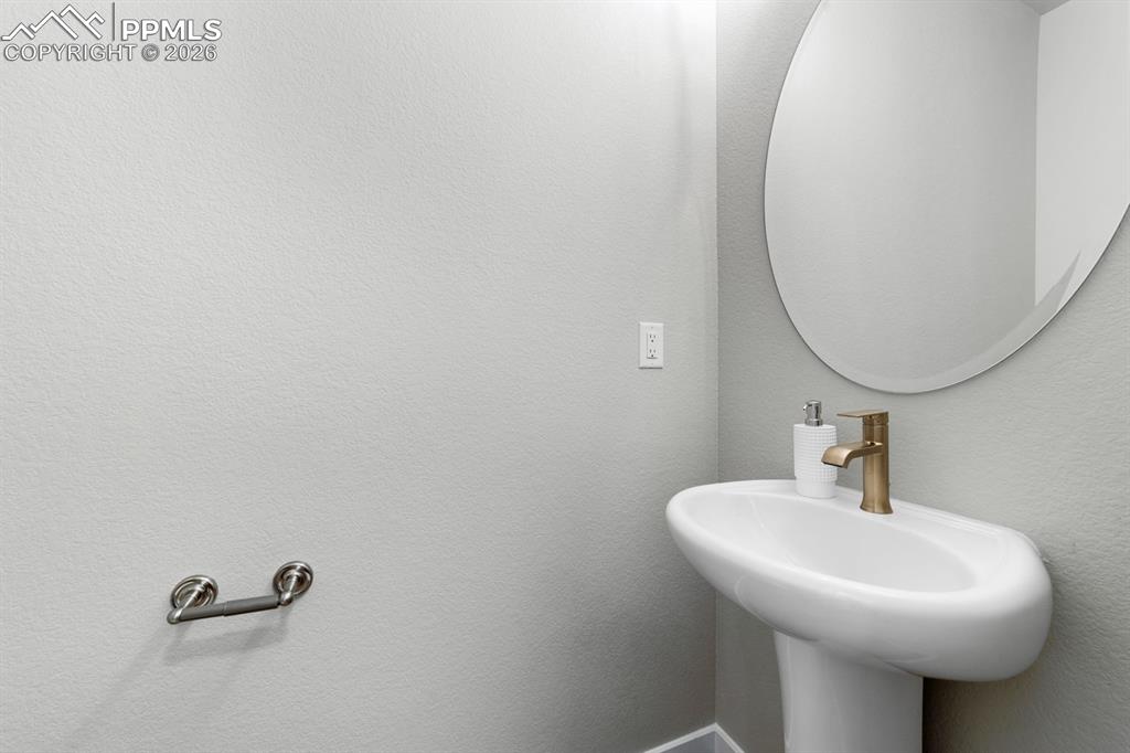 5153 Palomino Ranch Point Colorado Springs, CO 80922 - Photo 8 of 16 Main Level Powder Room