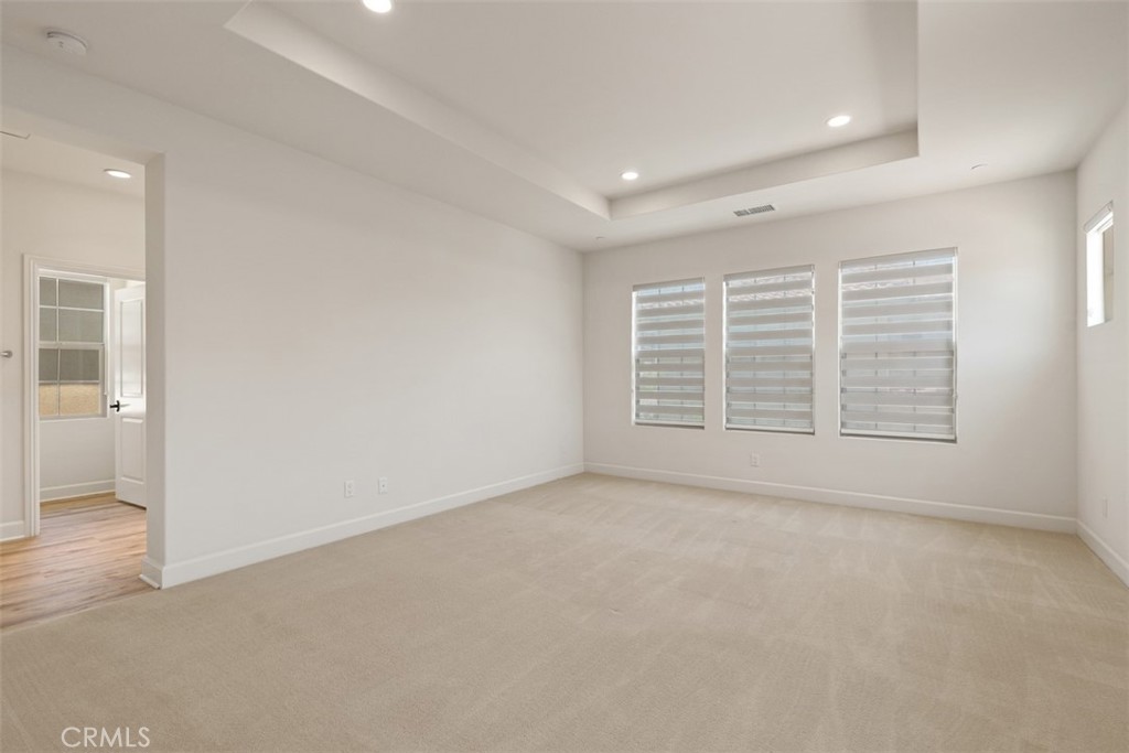 116 Windswept Irvine, CA 92618 - Photo 25 of 74 an empty room with windows