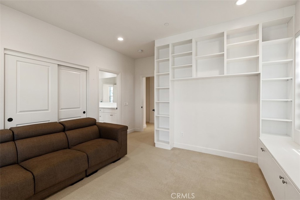 116 Windswept Irvine, CA 92618 - Photo 35 of 74 a living room with furniture and a closet