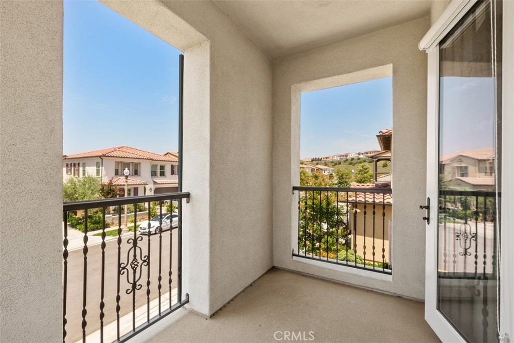 116 Windswept Irvine, CA 92618 - Photo 36 of 74 a view of a porch with a floor to ceiling window