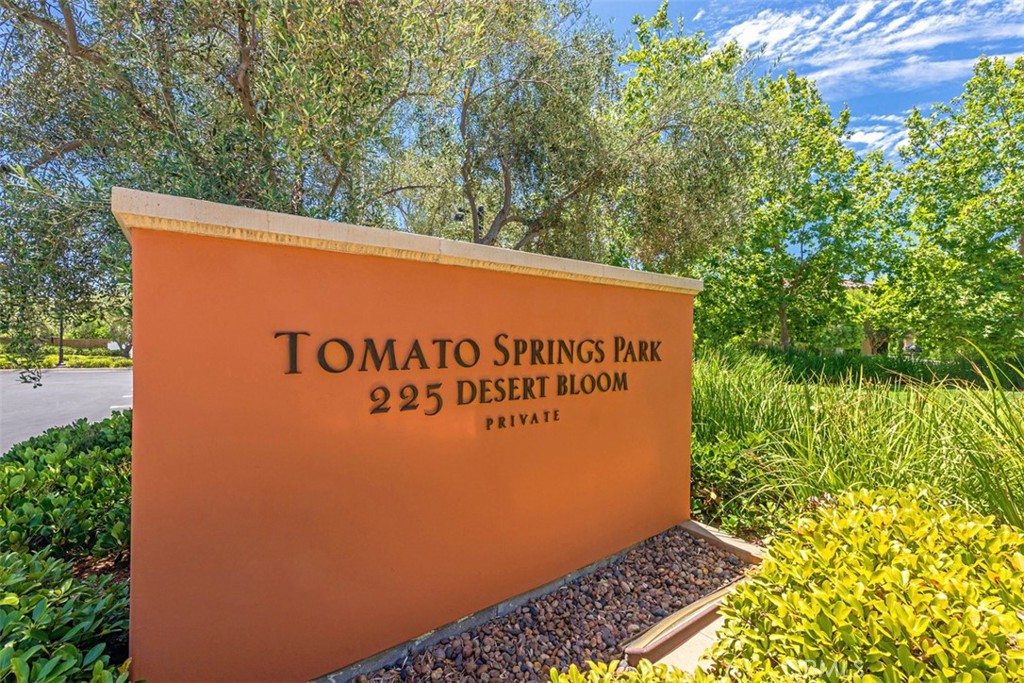 116 Windswept Irvine, CA 92618 - Photo 47 of 74 a sign that is sitting on a wooden wall