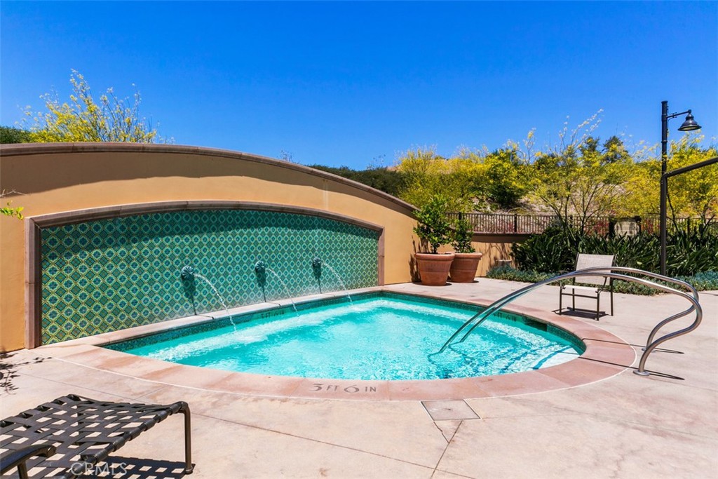 116 Windswept Irvine, CA 92618 - Photo 69 of 74 a view of a backyard with sitting area