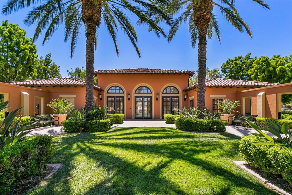 116 Windswept Irvine, CA 92618 - Photo 70 of 74 a view of a house with a yard