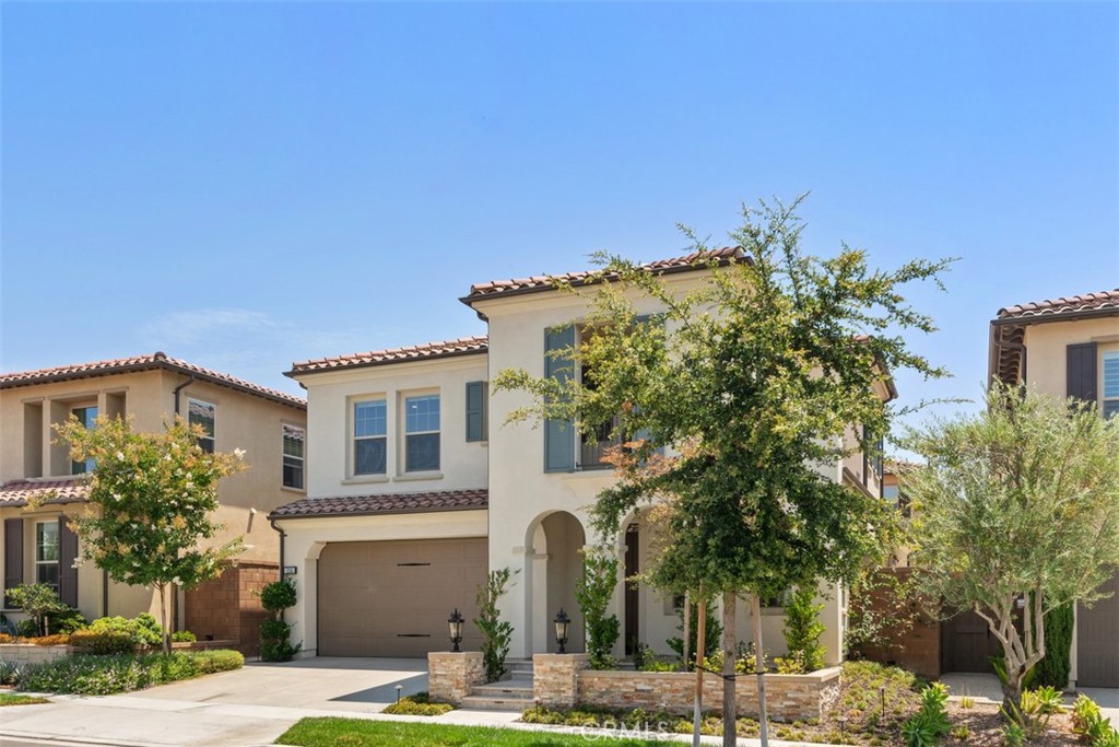 116 Windswept Irvine, CA 92618 - Photo 73 of 74 a front view of a house with garden
