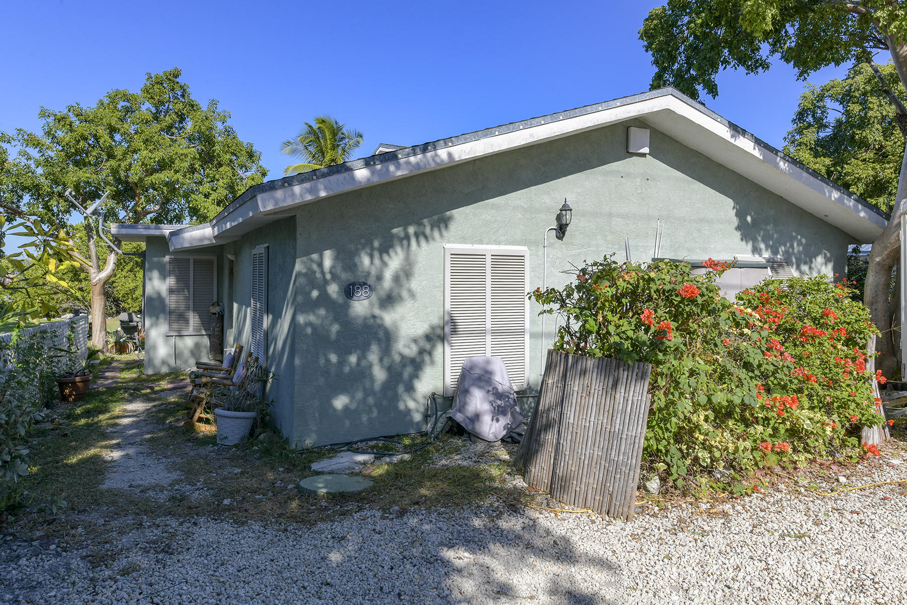 186 Harborview Drive Tavernier, FL 33070 - Photo 14 of 32 a front view of a house with a yard